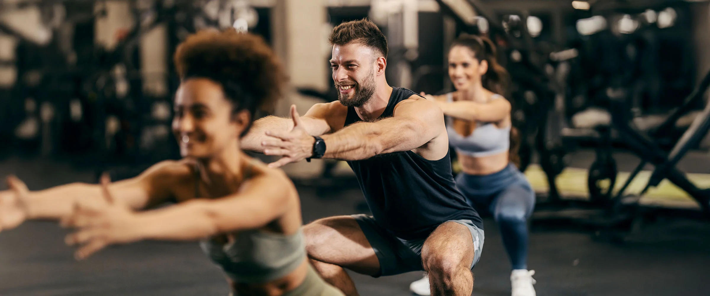 Group performing a full-body workout